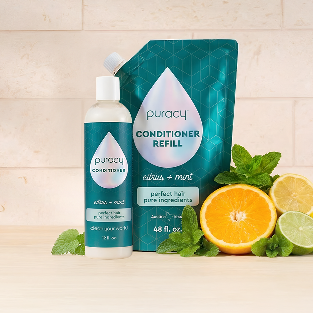 Conditioner (Silicone/Dimethicone/Sulfate Free), plant-based for silky hair, shown with fruit on wood.