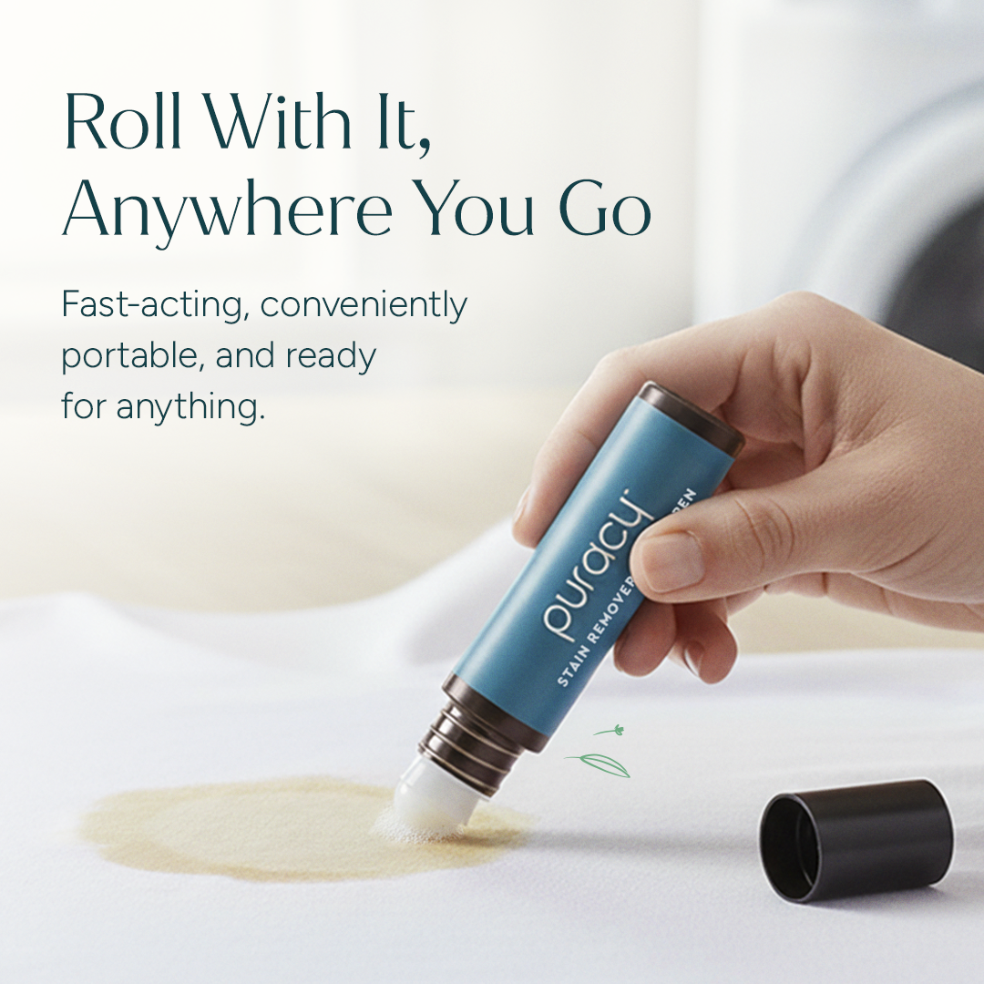 A hand uses a Stain Remover Roller Pen on fabric; cap nearby. Free 4-oz bottle for new customers.