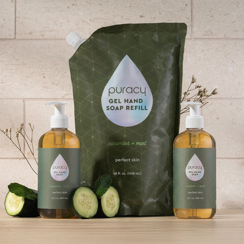 Puracy Gel Hand Soap refill pouch and pump bottles with plant-based ingredients nearby.