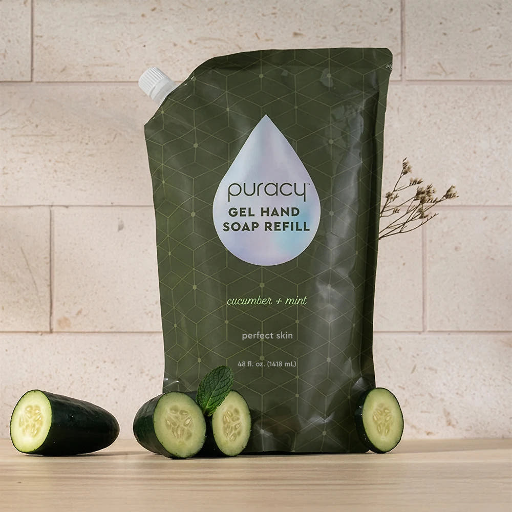 Gel Hand Soap refill with plant-based ingredients, cucumber, and mint scent on wood.