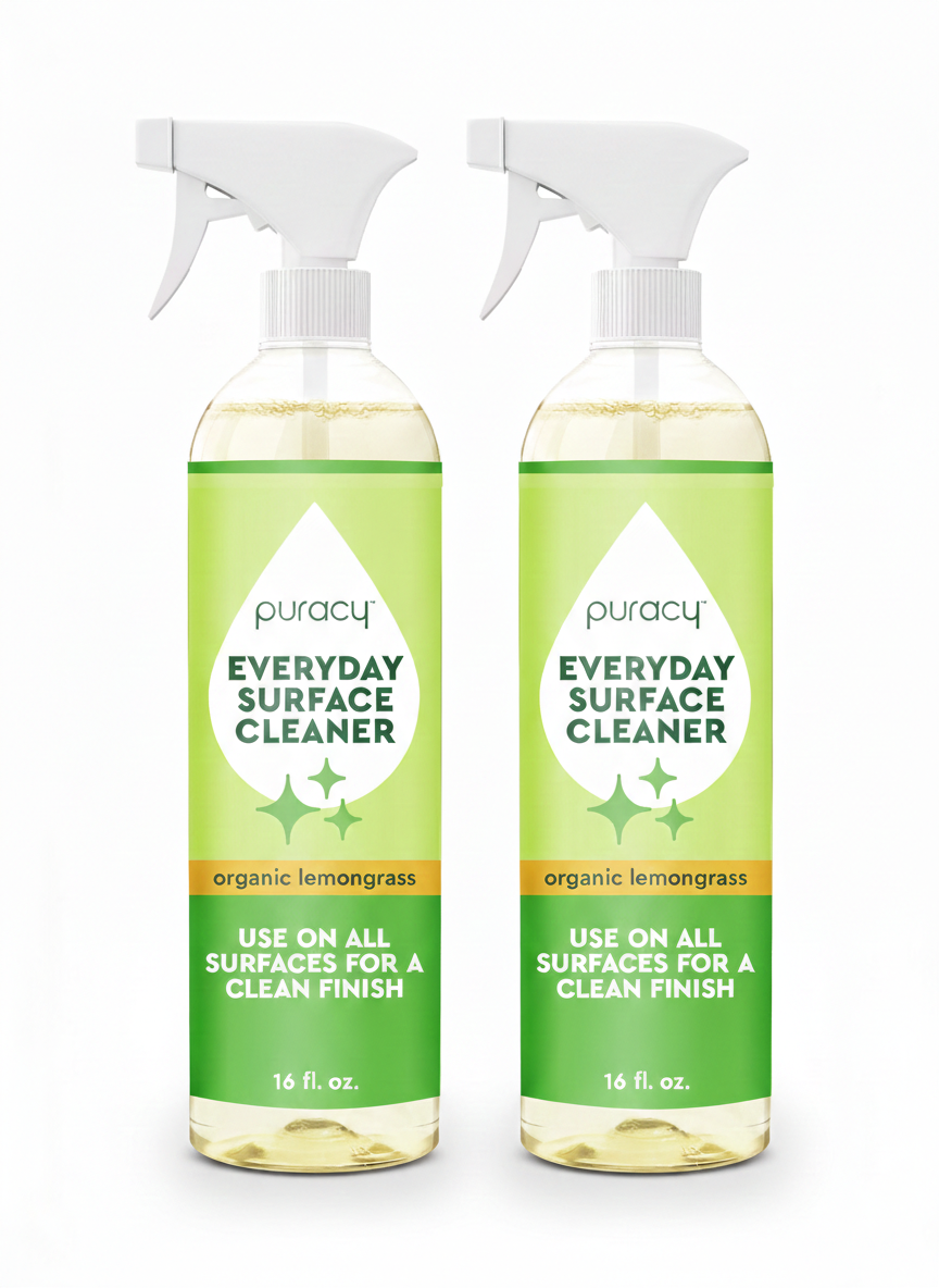 Two bottles of Everyday Multi-Surface Cleaner in organic lemongrass scent with spray tops.