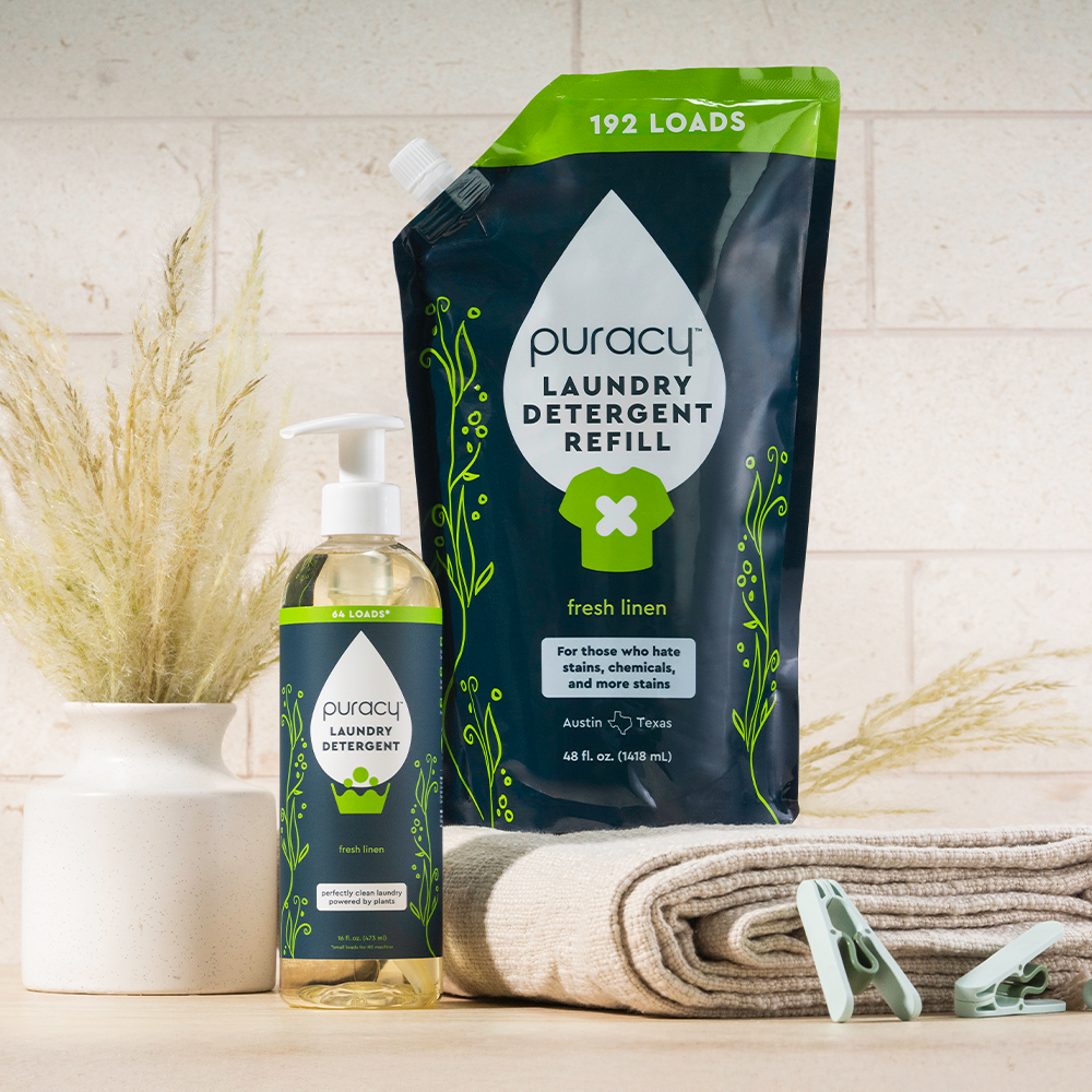 Laundry Detergent (Concentrated, Sulfate-Free) with towels and clothespins on a table.