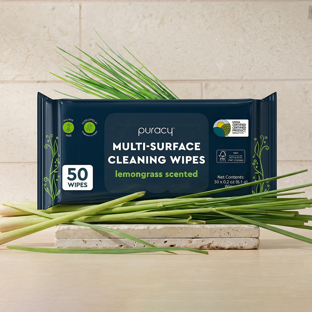 Multi-Surface Cleaner Wipes, plant-based, lemongrass scent, 50 count, with lemongrass stalks in front.