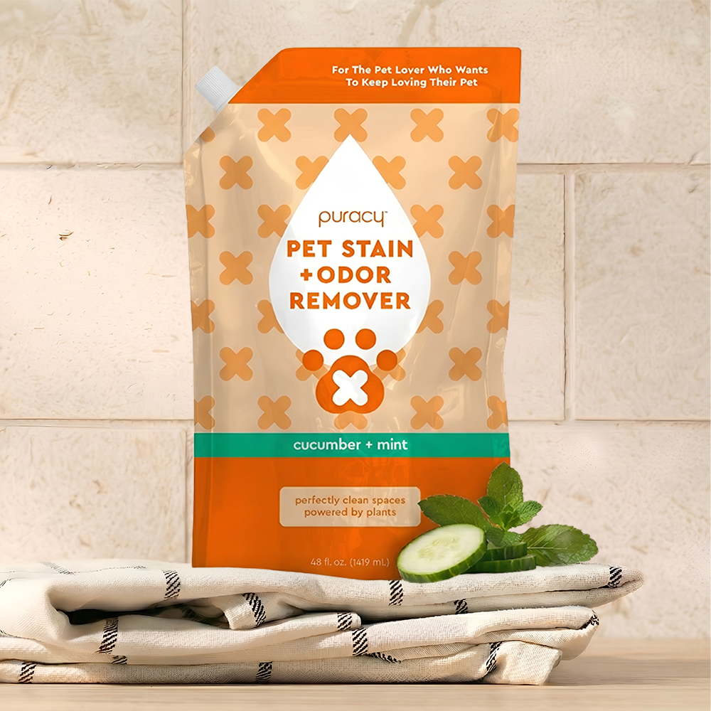 Pet Stain & Odor Remover pouch—cucumber, mint, towel; enzyme cleaner effective on tile.