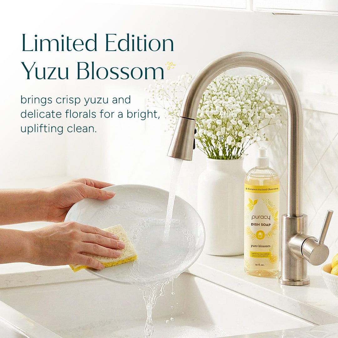 Hands washing a plate with Dish Soap, scented with Yuzu Blossom, by the kitchen faucet. #common #scent_yuzu-blossom standard-pack-of-3_#size