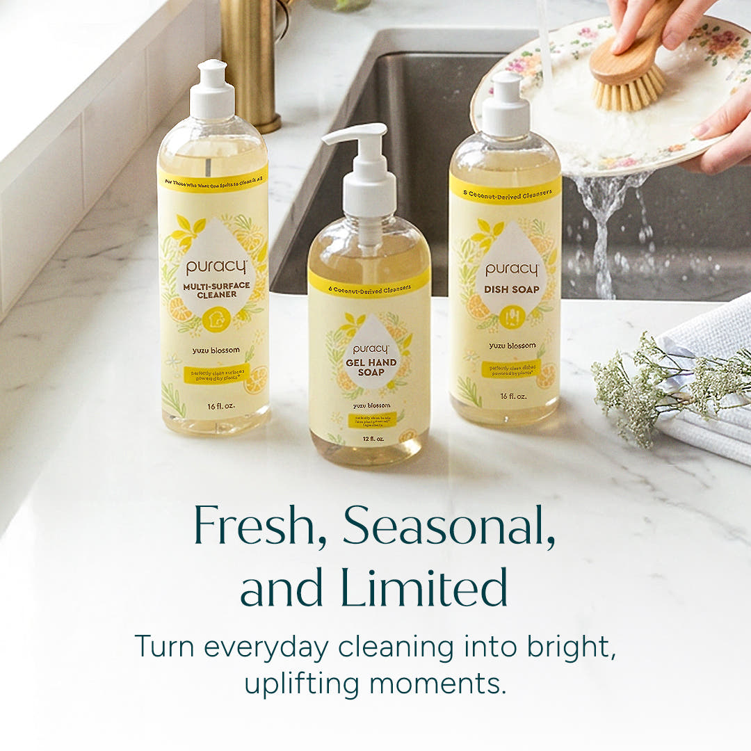 Three bottles of Dish Soap on a kitchen counter, as someone washes a dish nearby. #common #scent_yuzu-blossom standard-pack-of-3_#size