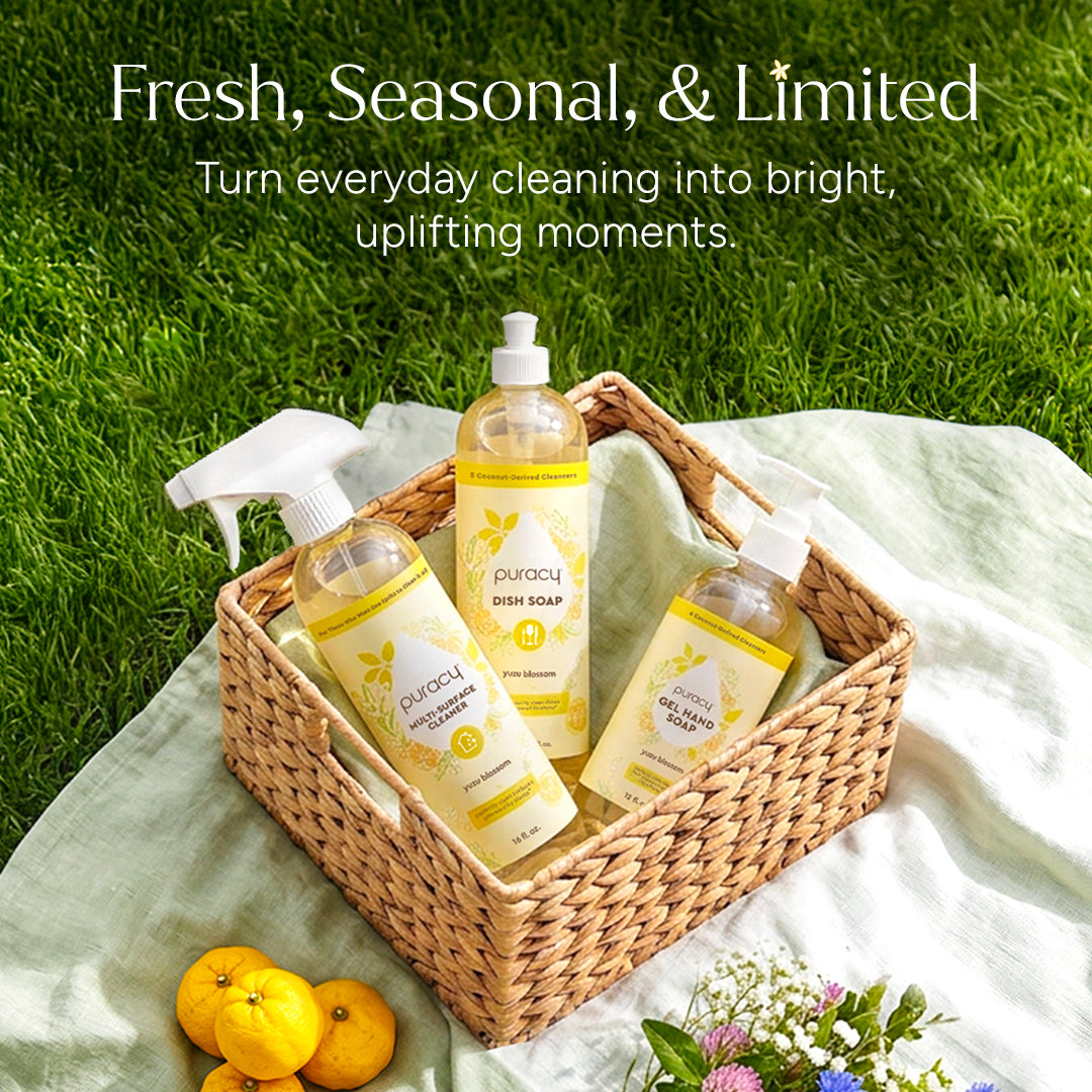 Dish Soap in a wicker basket with lemons and flowers on a blanket laid out on the grass. #common #scent_yuzu-blossom standard-pack-of-3_#size