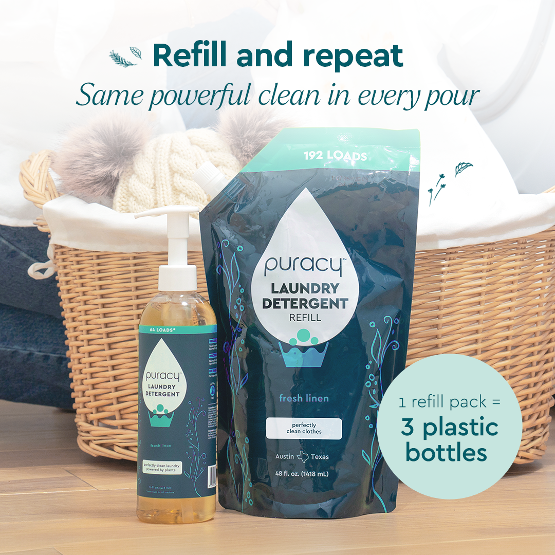 Puracy Laundry Detergent (Concentrated, Sulfate-Free) pouch and dispenser in front of laundry basket.#common#scent_fresh-linen