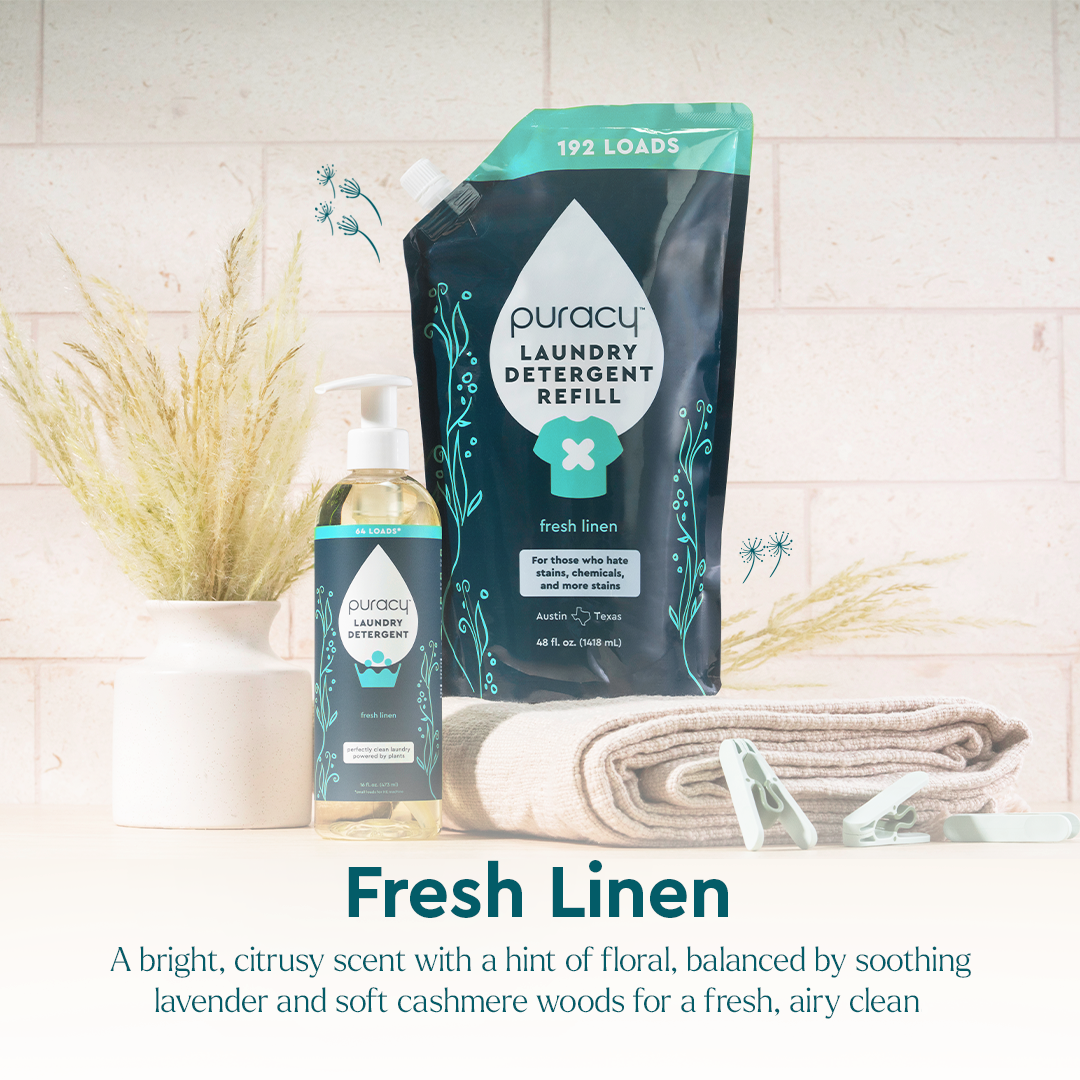 Laundry Detergent (Concentrated, Sulfate-Free) refill and bottle next to folded towels and clothespins.