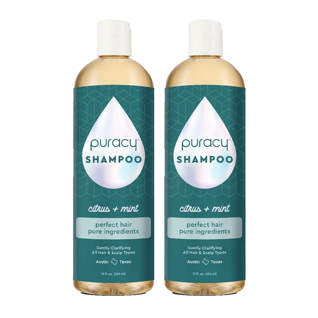 Two bottles of Puracy Shampoo (Sulfate/Paraben/Silicone-Free) with a blend of citrus and mint, enriched with botanical extracts, featuring teal labels.