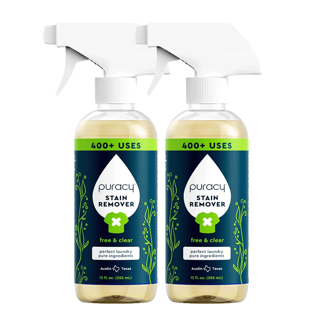 Two bottles of Free & Clear Laundry Stain Remover with white nozzles by Puracy.