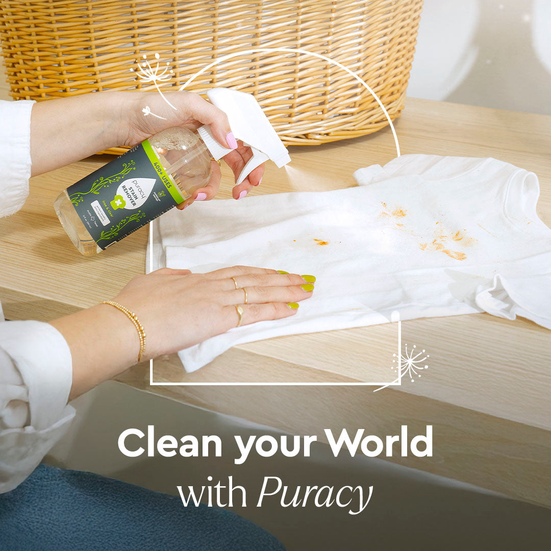 A person sprays Laundry Stain Remover on a white shirt next to text: Clean your World with Puracy.