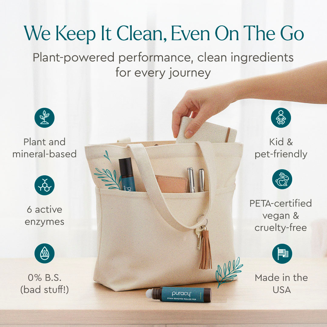 A hand places Laundry Stain Remover, a plant-based spray, into a beige tote with clean ingredients.