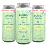 Three cans of Everyday Multi-Surface Cleaner by Puracy, available in an eco-friendly green design with a plant logo and lemongrass scent.