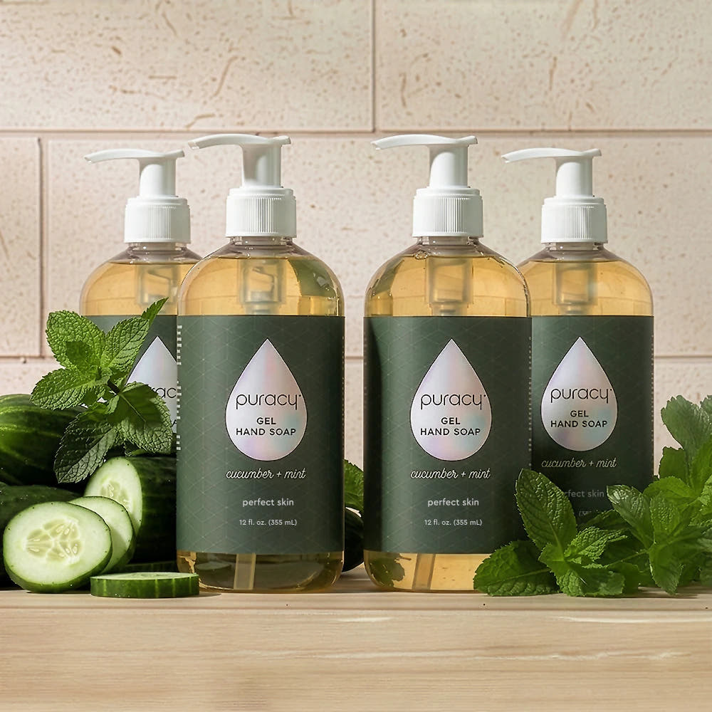 Four bottles of Gel Hand Soap with cucumber and mint, shown with fresh cucumber and mint leaves.