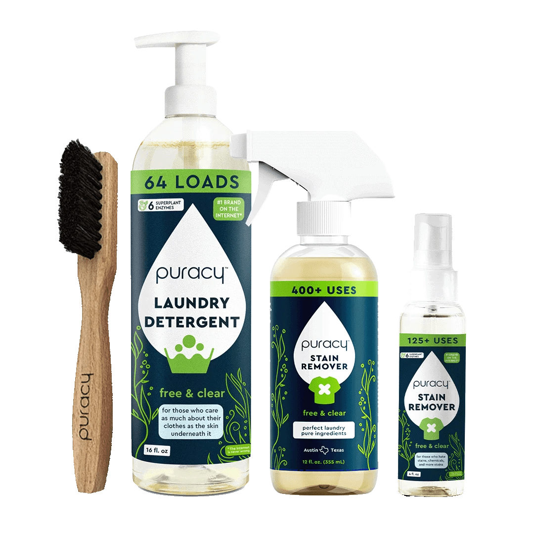 Explore the Laundry Essentials Bundle, which includes a wooden brush, laundry detergent, and stain removers set against a green background. Enhance your laundry routine and combat stubborn stains with our eco-friendly solution.