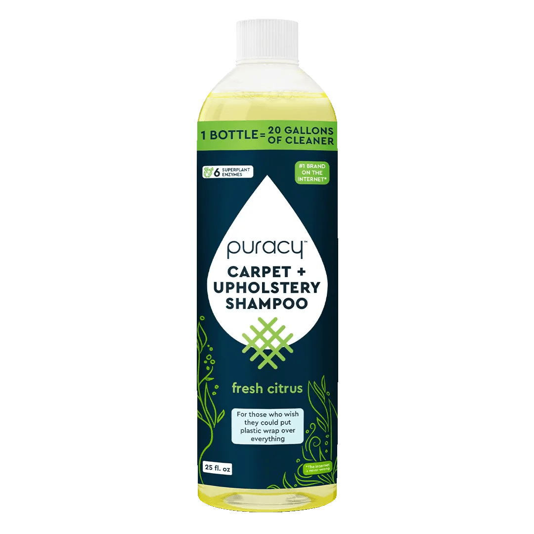 A 25 fl oz bottle of Carpet & Upholstery Shampoo, fresh citrus scent, 4x concentrated formula.