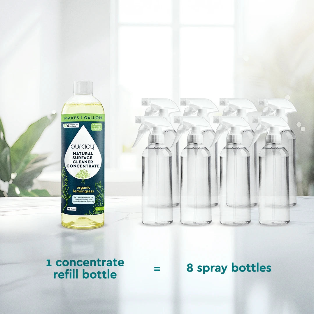 An Everyday Multi-Surface Cleaner concentrate bottle and eight empty spray bottles bask on a sunny table, ready to tackle any mess with eco-friendly power.