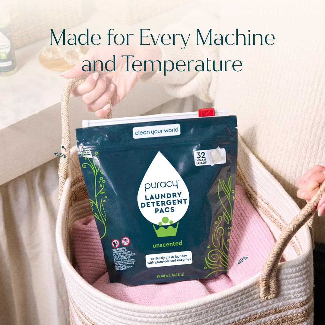 A person adds Laundry Detergent Pacs to folded clothes for powerful stain removal.