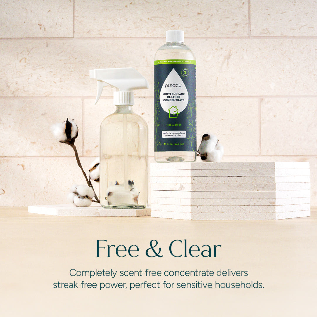 Two clear bottles of Everyday Multi-Surface Cleaner with a plant-based “Free & Clear” formula.