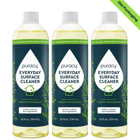 Three bottles of Everyday Multi-Surface Cleaner with organic lemongrass, labeled as old packaging. This eco-friendly choice offers versatile cleaning for your home.