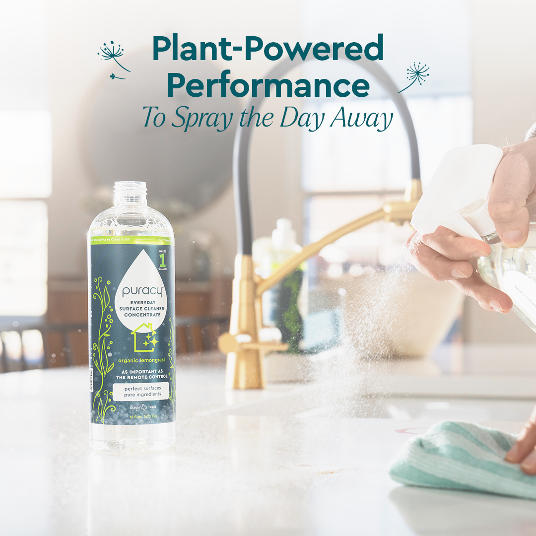 A person sprays Refill (Natural Multi-Surface Cleaner Concentrate) on a kitchen counter.#scent_organic-lemongrass|size_concentrate
