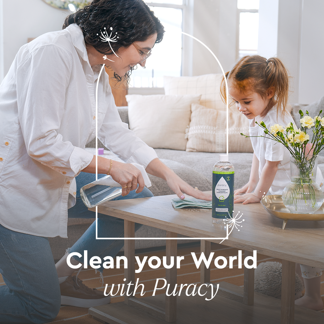 Woman and young girl clean a table with Refill (Natural Multi-Surface Cleaner Concentrate) and cloths.#scent_organic-lemongrass|size_concentrate