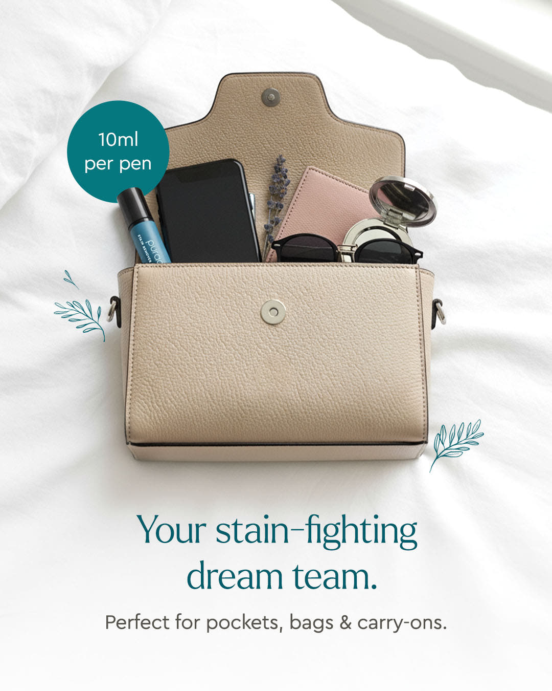 Beige purse on bed with phone, sunglasses, wallet, and a Stain Remover Roller Pen inside.